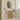 CharmyDecor oak-look bathroom vanity with a white sink beneath an organic-shaped mirror in a bright bathroom