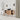 CharmyDecor oak-look floating bathroom vanity in an angled bathroom scene with towels arranged in the open shelves