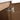 CharmyDecor oak-look floating bathroom vanity close-up of a door hinge and wood-grain surfaces