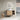 CharmyDecor oak-look floating bathroom vanity with a white vessel sink and open storage in a styled bathroom
