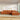 Charmydecor orange chenille modular sofa with chaise ottoman in a bright modern living room