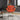 charmydecor orange swivel accent chair styled in modern living room interior
