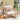 charmydecor outdoor acacia wood patio club chair with beige cushions and brown wash frame on a covered patio