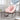 charmydecor oversized outdoor rattan rocking chair with pink padded cushion in living room