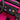 Close-up of a pink toy car's dashboard with control buttons and steering wheel.