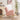charmydecor pink sherpa rocking chair side view with smooth wooden rocker base