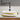 CharmyDecor rectangular vessel sink on a white countertop, showing its curved profile and reflective gold-colored accents.