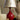 CharmyDecor red ceramic table lamp detail showing curved ceramic handle and glossy red finish
