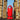 CharmyDecor red rocket trash can photographed against retro industrial architecture