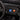 CharmyDecor ride on car power button and control switches blue and orange dashboard detail close-up