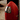 CharmyDecor rocket trash can close-up showing curved red body and polished push flap