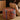 CharmyDecor round ottoman with plush supportive shape and multicolor jacquard upholstery