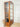 charmydecor side view of african teak arched glass display cabinet