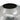 Close-up of a metallic object with a textured surface on a white background