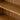 Charmydecor solid acacia wood bookshelf shelf surface close up with rich natural grain texture