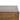 Close-up of a wooden drawer with a metallic knob on a white background
