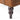 Close-up of a brown upholstered chair with studded details and a wooden leg on a white background