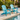 charmydecor turquoise blue folding Adirondack chair set of 2 styled beside an outdoor swimming pool