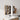 CharmyDecor wall mounted medicine cabinet in a bathroom with the main mirror angled open and the narrow storage door open.