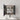 CharmyDecor wall mounted medicine cabinet with both doors open, displaying towels and toiletries on glass shelves