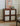 Wooden cabinet with decorative doors in a room setting