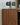 Flip clock on a wooden surface with a blurred background