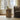 Charmydecor walnut side table styled by sofa with plant books and drink