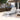 Charmydecor white aluminum outdoor chaise lounge with light gray Textilene mesh on a modern patio