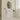 CharmyDecor white bathroom vanity with sink beneath a sculptural mirror in a bright bathroom.