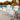 White embossed wood folding Adirondack chairs set of 2 beside a swimming pool by charmydecor