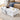 Charmydecor white faux marble coffee table styled in a modern living room with tan sofa