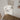CharmyDecor white floating bathroom vanity viewed from above in a sunlit bathroom setting.