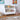 charmydecor white kids bookshelf with wavy edges holding books and toys in playroom