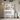 Charmydecor white makeup vanity desk with lighted mirror and storage shelves styled in bedroom
