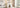 Charmydecor white makeup vanity with Hollywood bulbs and storage shelf near large bedroom window