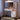 Charmydecor white makeup vanity with lighted mirror and side storage cabinet creating a cozy bedroom beauty station at night