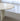 Charmydecor white marble coffee table close up showing semi polished marble edge and natural veining