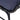 Close-up of a navy blue cushion on a chair with black metal frame.