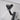 close up of matte black bathroom faucet shower spray mode