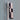 Close-up of scarf hanging on modern coat rack