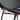 Close-up of padded black leather seat on walnut chair
