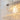 Detailed edge view of acrylic flush mount ceiling light with chrome bolt