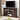 Espresso TV stand with TV, game consoles, and books in a bright modern farmhouse room.