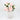 Front view of ceramic vase with artificial peonies