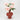 Full floral arrangement in terracotta vase with soft pink peonies