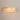 Glowing acrylic flush mount ceiling light on white ceiling