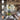 industrial plug-in pendant lights hanging in rustic living room with E26 bulb compatibility chart