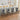 CharmyDecor kitchen counter swivel stool set of 4 in gray velvet arranged at kitchen island showing full dining seating layout