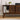 Left side of the TV stand, showing storage for books and decor with rattan door partially open