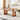 Living room coffee table walnut wood with rattan legs and rug top view